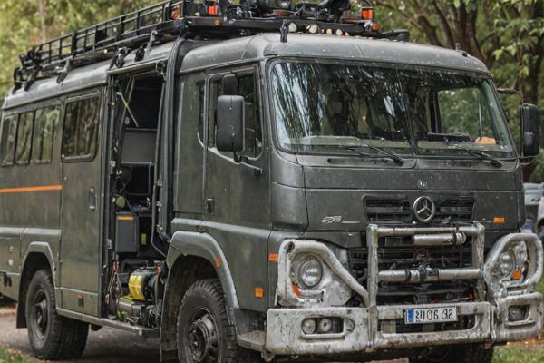 Commercial fleet vehicle modification with equipment mounting